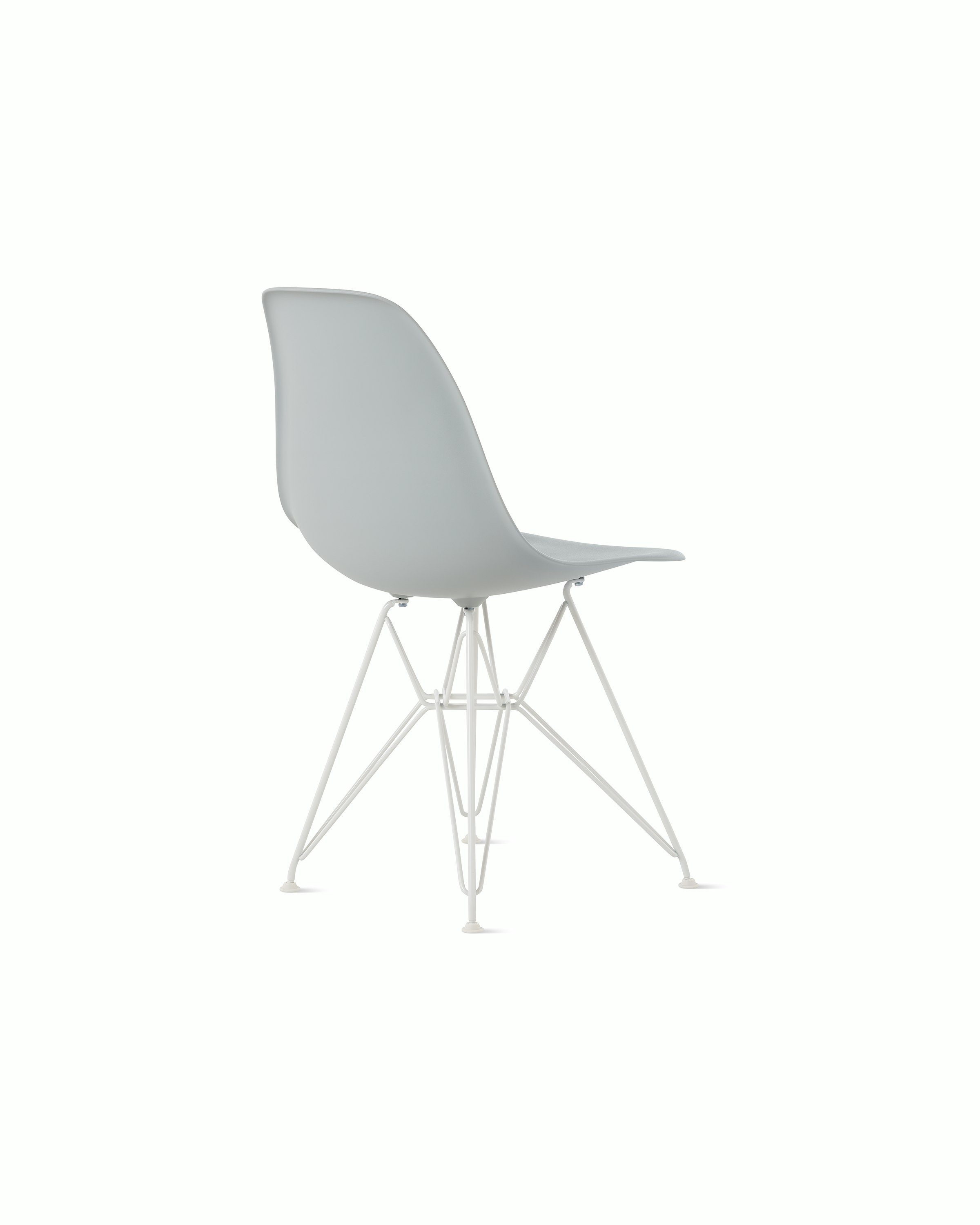 Back angle of light grey plastic shell chair on wire base.