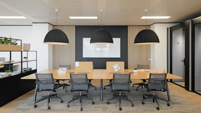 Eight Cosm Chairs by Herman Miller arranged around a Morse Table System by NaughtOne at the NATO Defence Innovation Accelerator in London