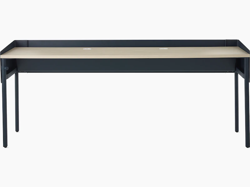 A single sided OE1 Communal Table with dark blue finish, and light brown surface viewed from the front.