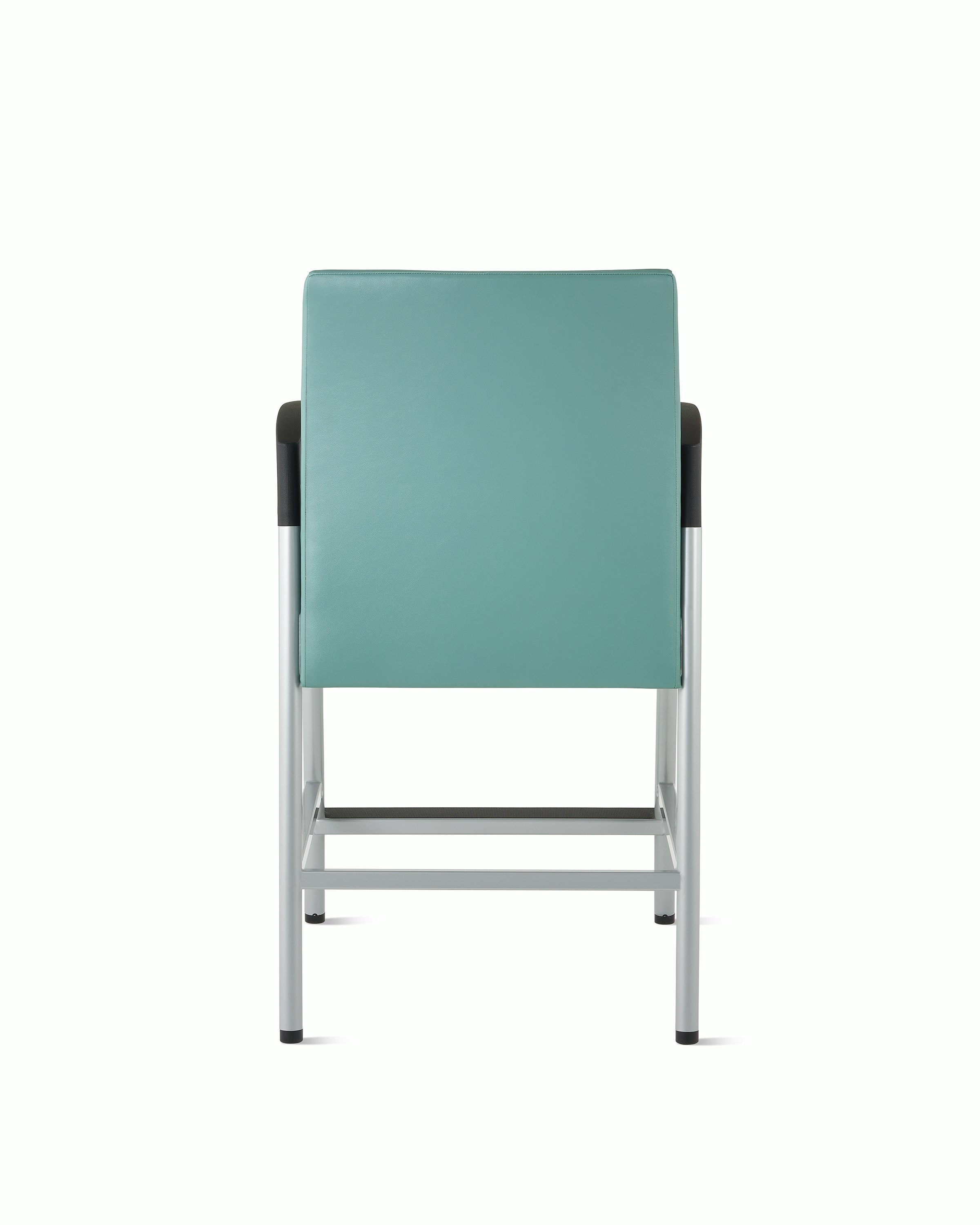 Back view of a Valor Easy Access chair in a blue-green upholstery with a silver frame and black armcaps on white sweep.
