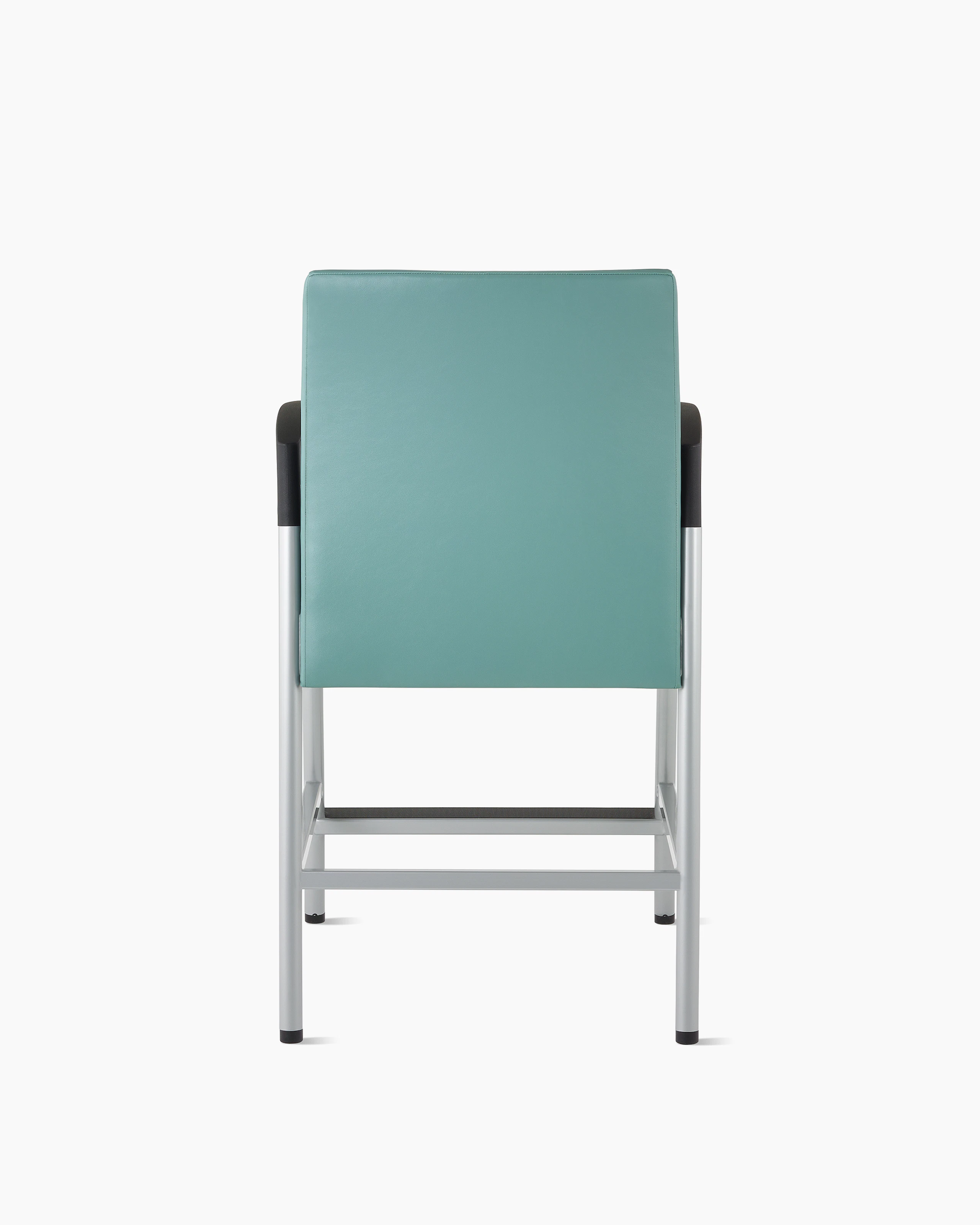 Back view of a Valor Easy Access chair in a blue-green upholstery with a silver frame and black armcaps on white sweep.