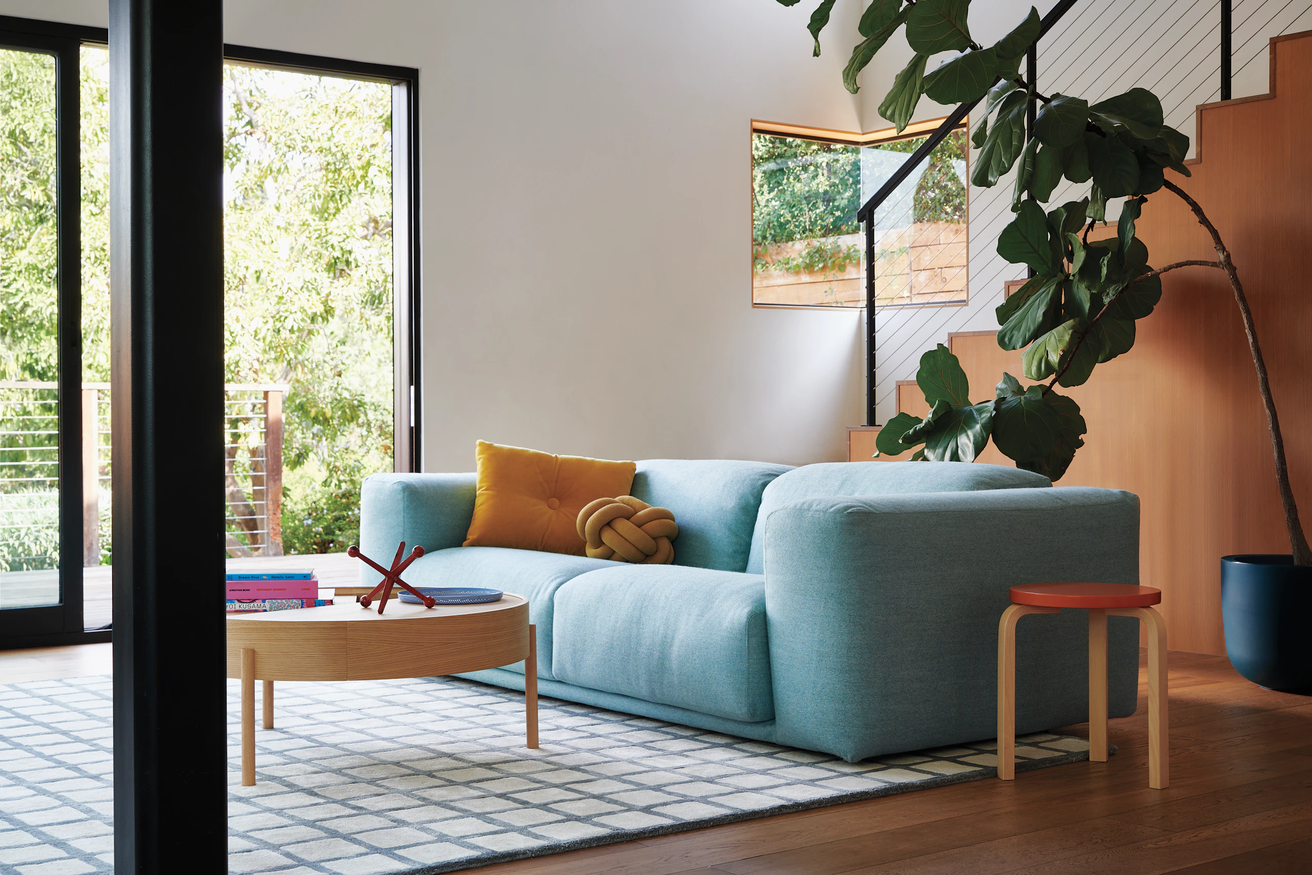 Ellen Bennett Living Room with Kelston Sofa, Arc Swivel Table and Maschi Rug