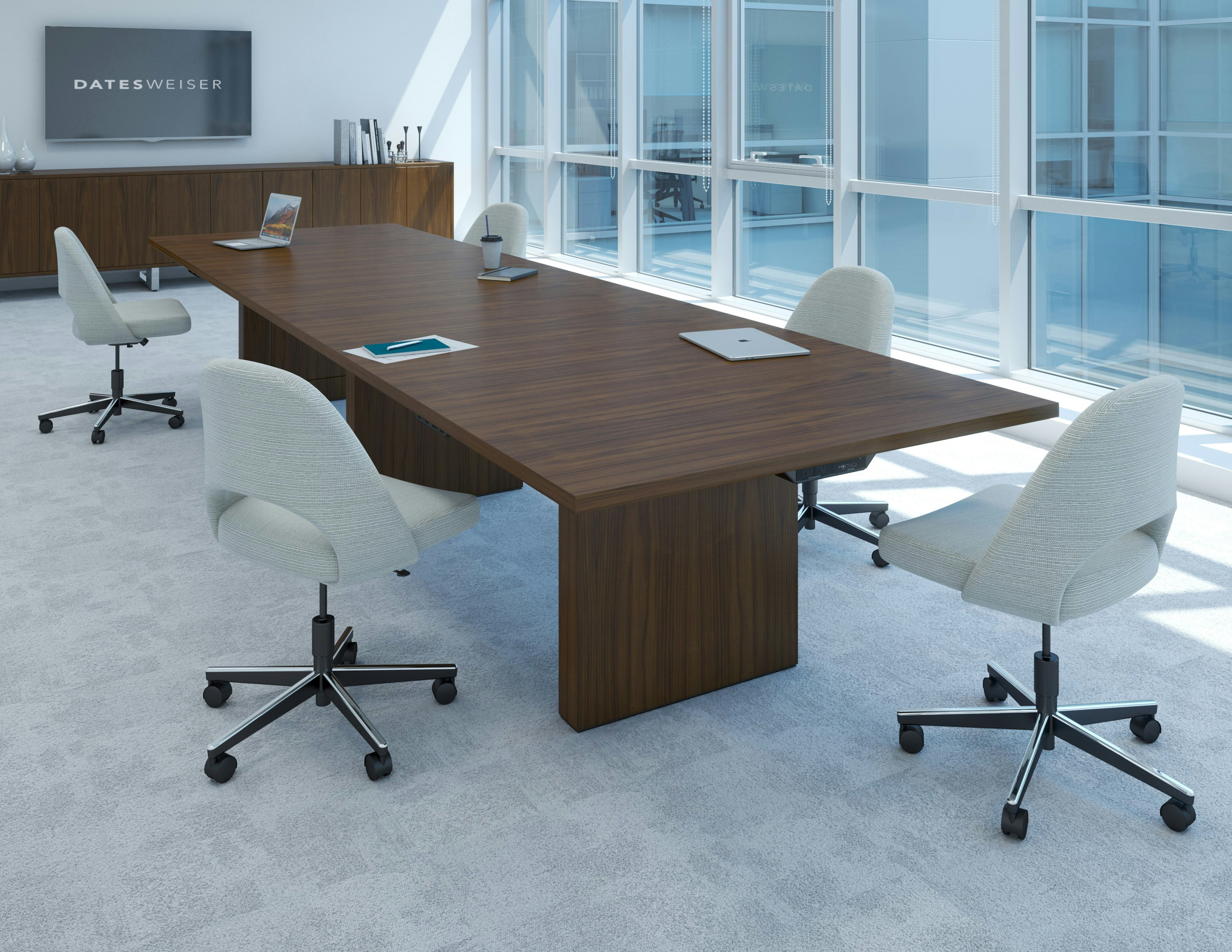 JD Conference Table with undermount technology surrounded by chairs in a conference room setting, angled view.