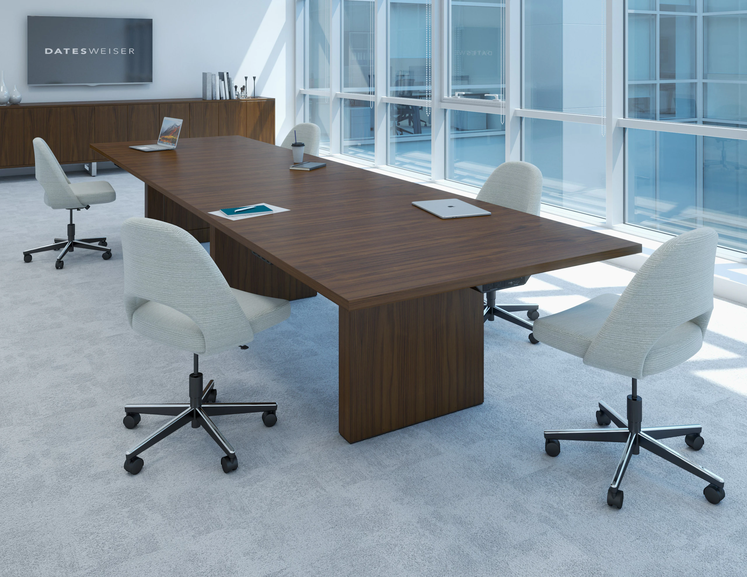 JD Conference Table with undermount technology surrounded by chairs in a conference room setting, angled view.