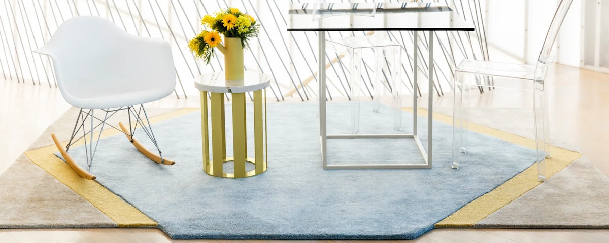 Blue Moon Rug with Eames Rocker and Ghost Chair in home setting