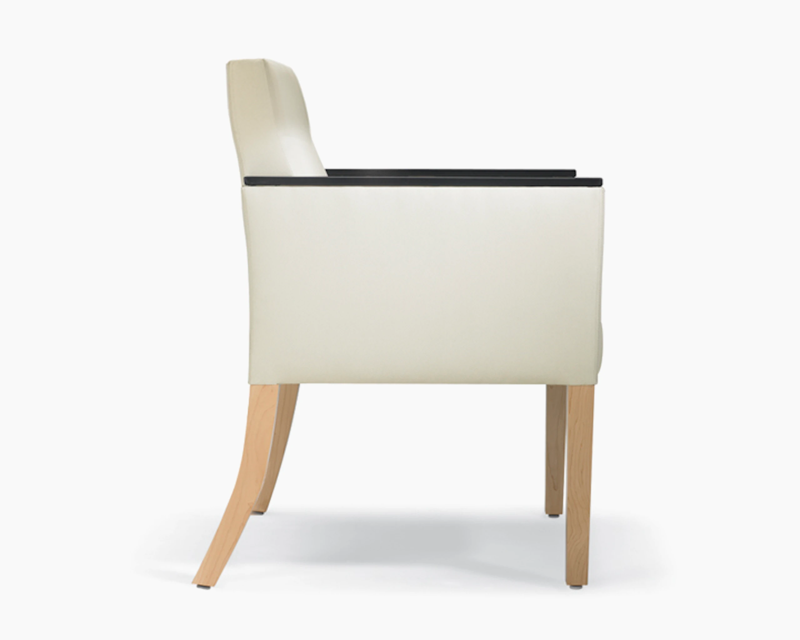 A side view of a Brava 862 Chair in white textile with urethane arm caps and maple legs.