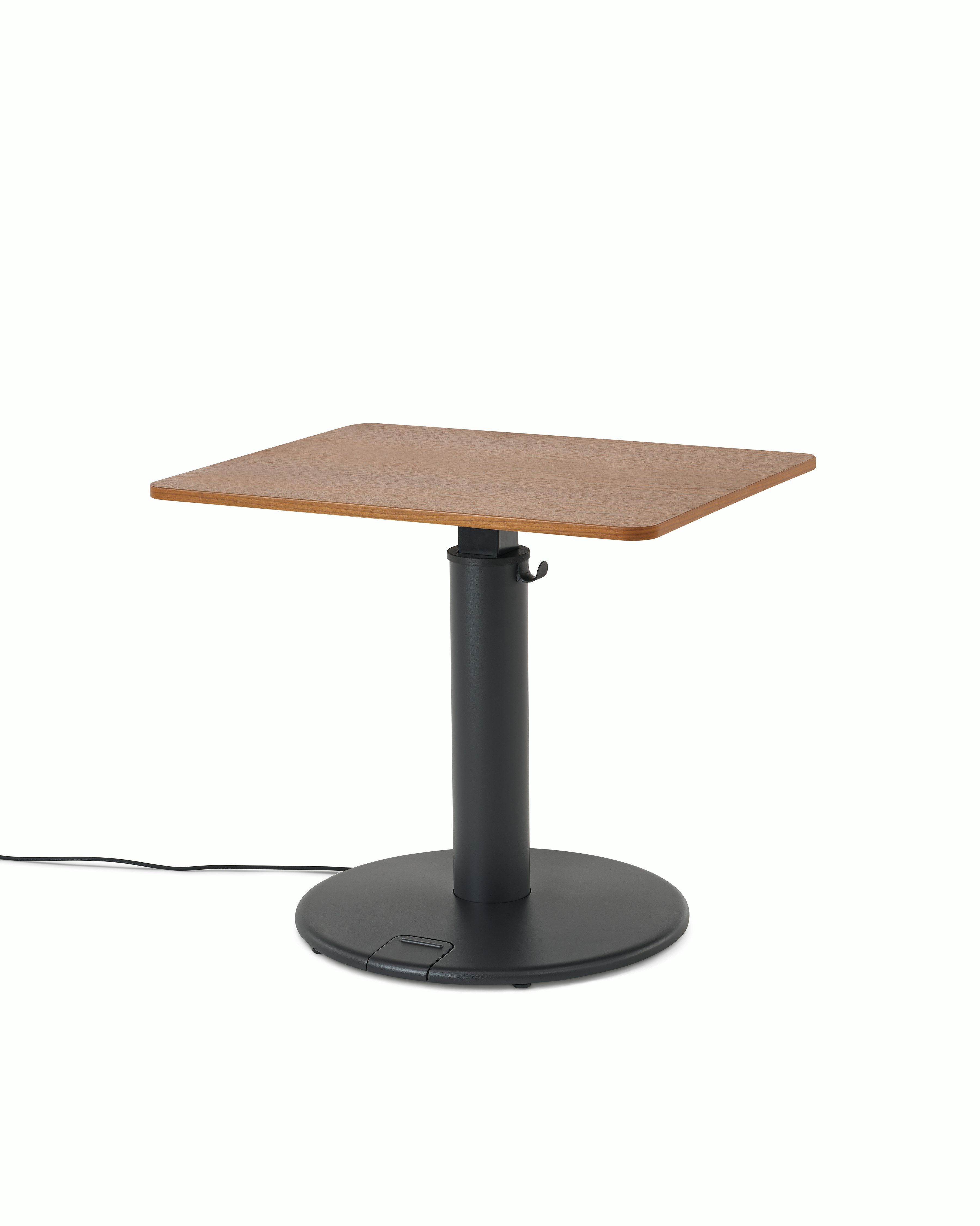 OE1 Sit-to-Stand Table with black base and brown rectangular surface viewed from a front angle. 