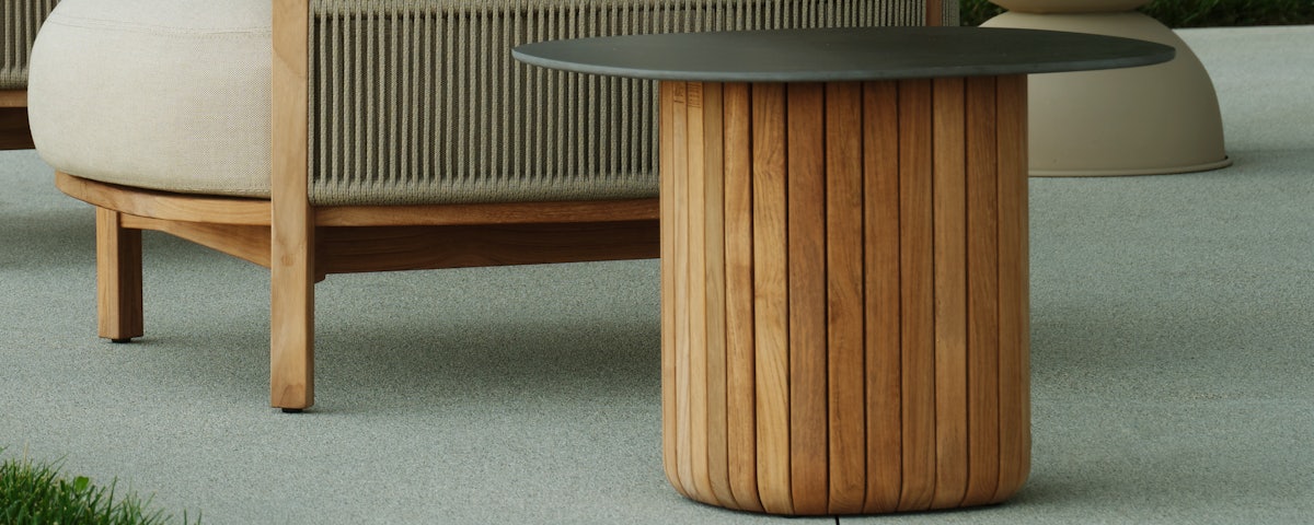 Softlands Outdoor Side Table in an outdoor lawn setting