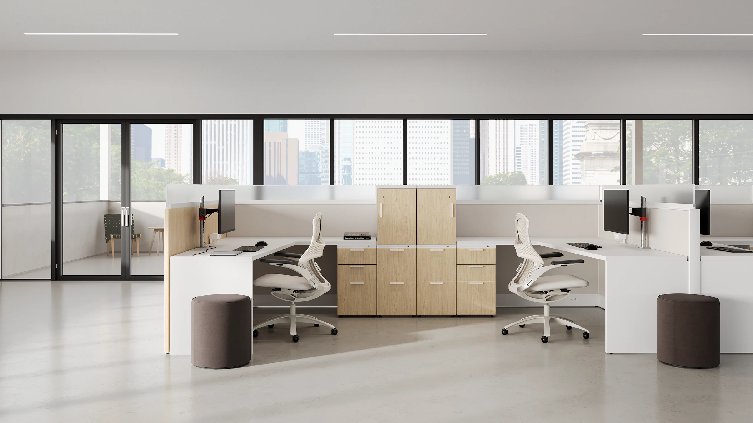 Open office setting with brown Series 2 storage with brown and white Dividends Skyline workstations and white Generation chairs.