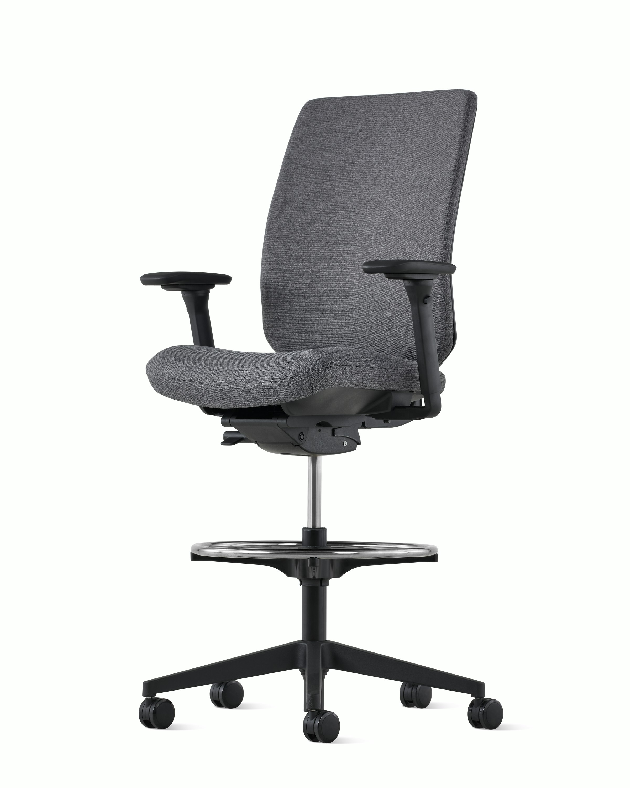 A black Verus Stool with an upholstered back, viewed at an angle.