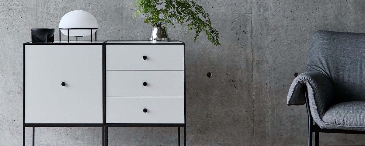 Frame Sideboard and Pump Table Lamp in an industrial loft bedroom setting