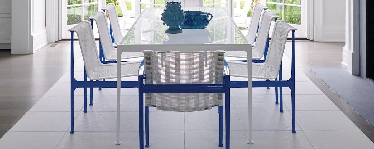 1966 Collection Dining Chairs around a 1966 Collection Dining Table in a dining room setting