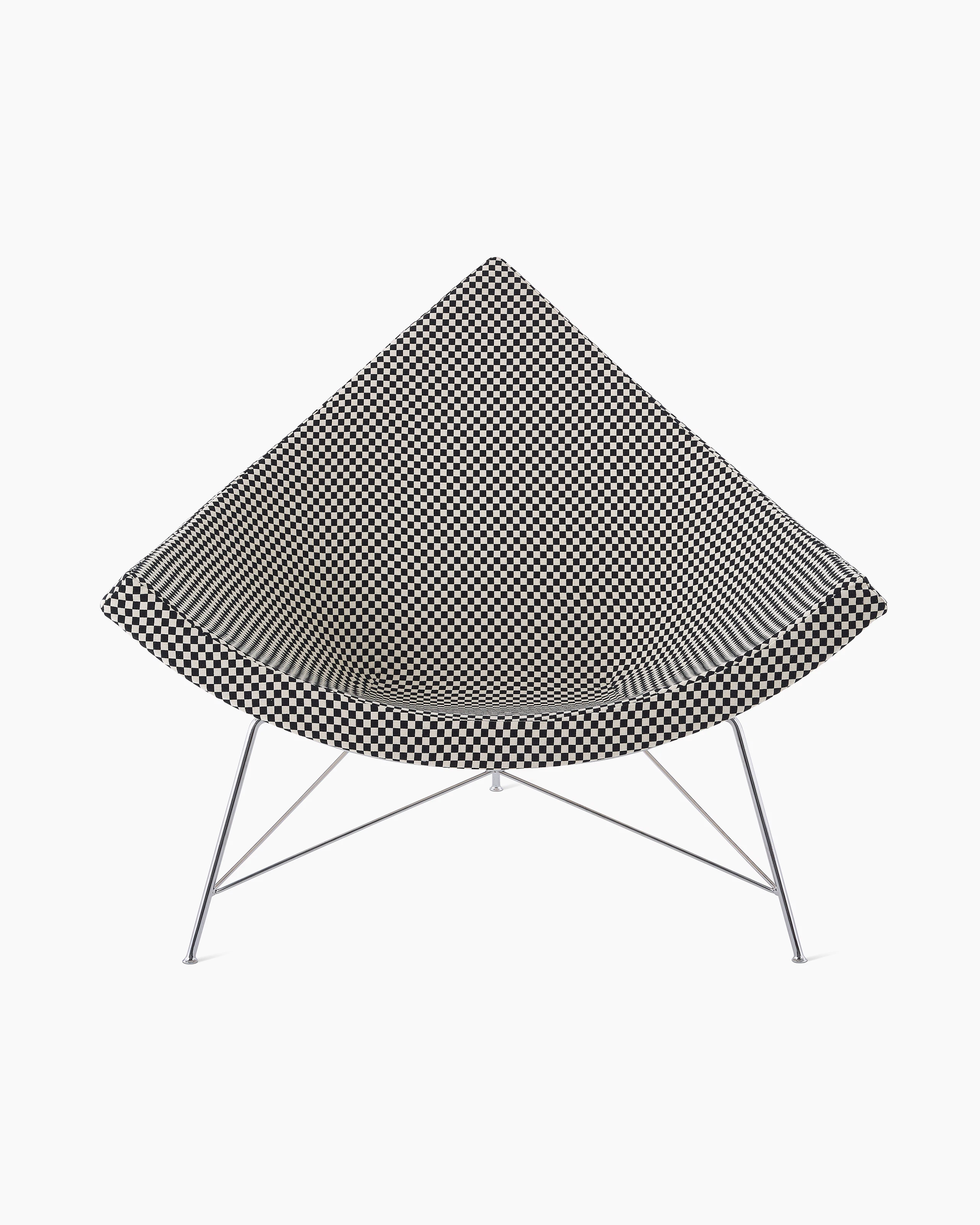 A Nelson Coconut Lounge Chair in a black and white Maharam checkerboard fabric viewed from straight on.