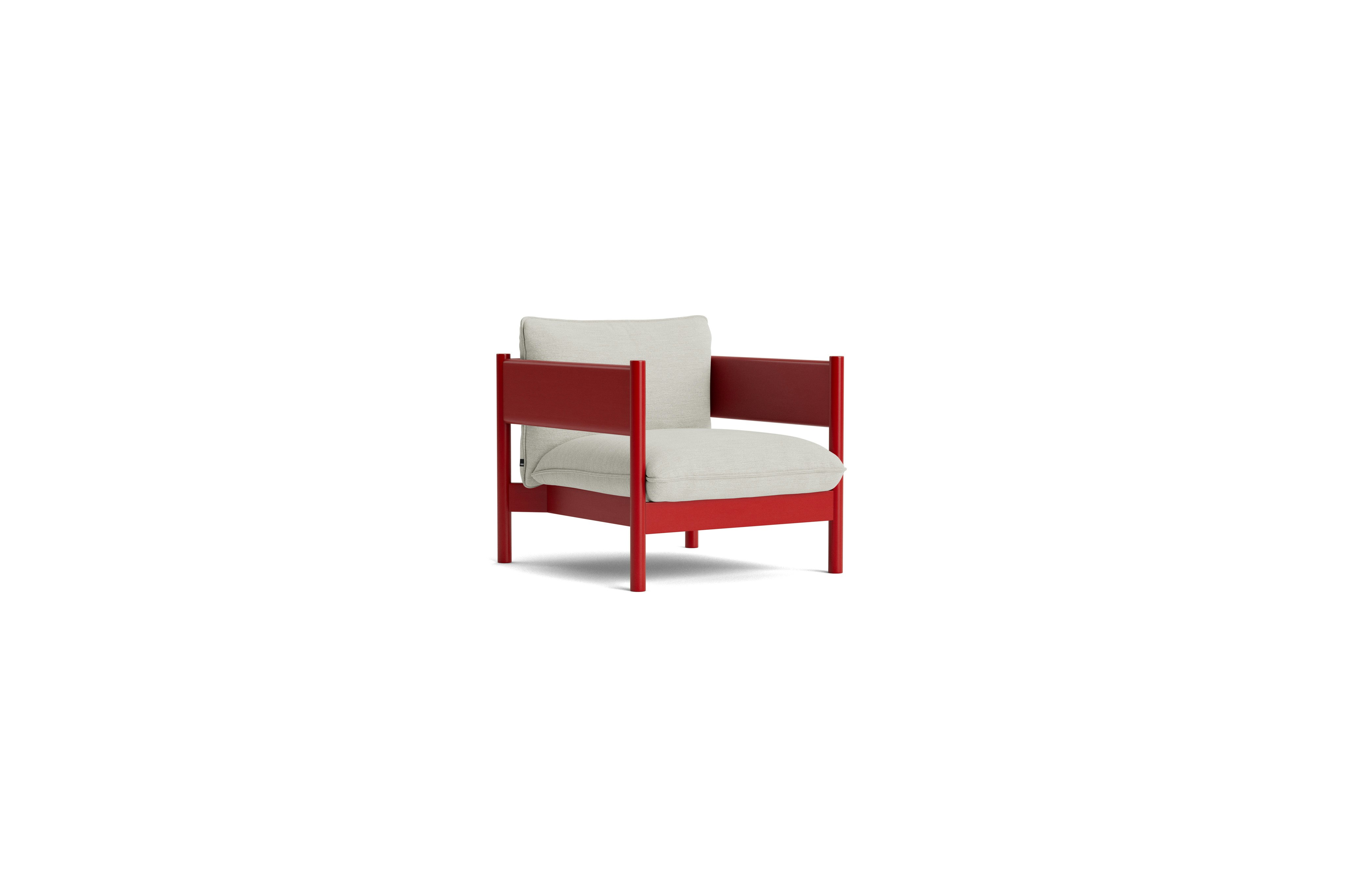 Arbour Club Armchair with red base and white upholstery viewed from an angle