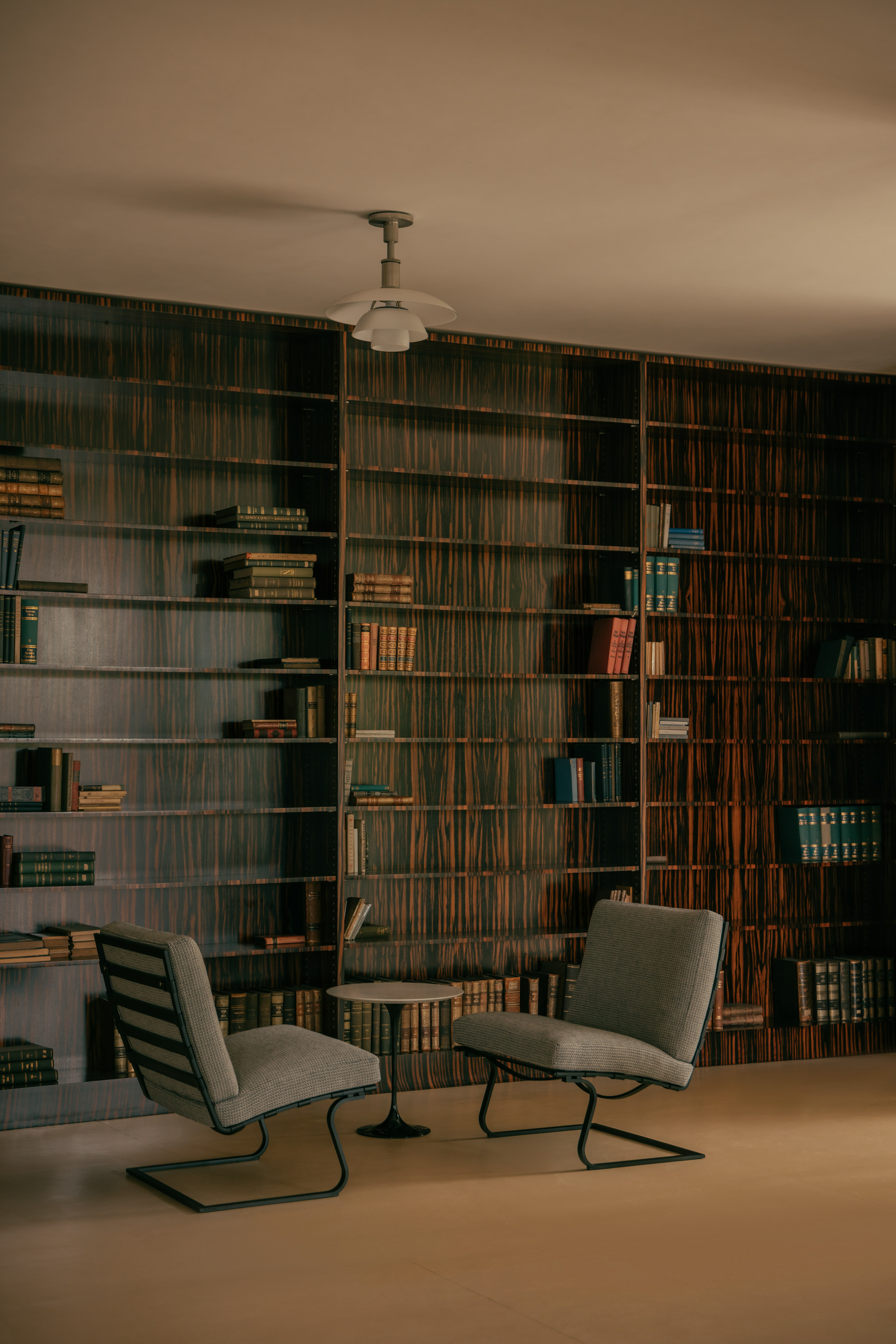 Tugendhat Chair in black and white upholstery with black frame and black leather straps at Villa Tugendhat.
