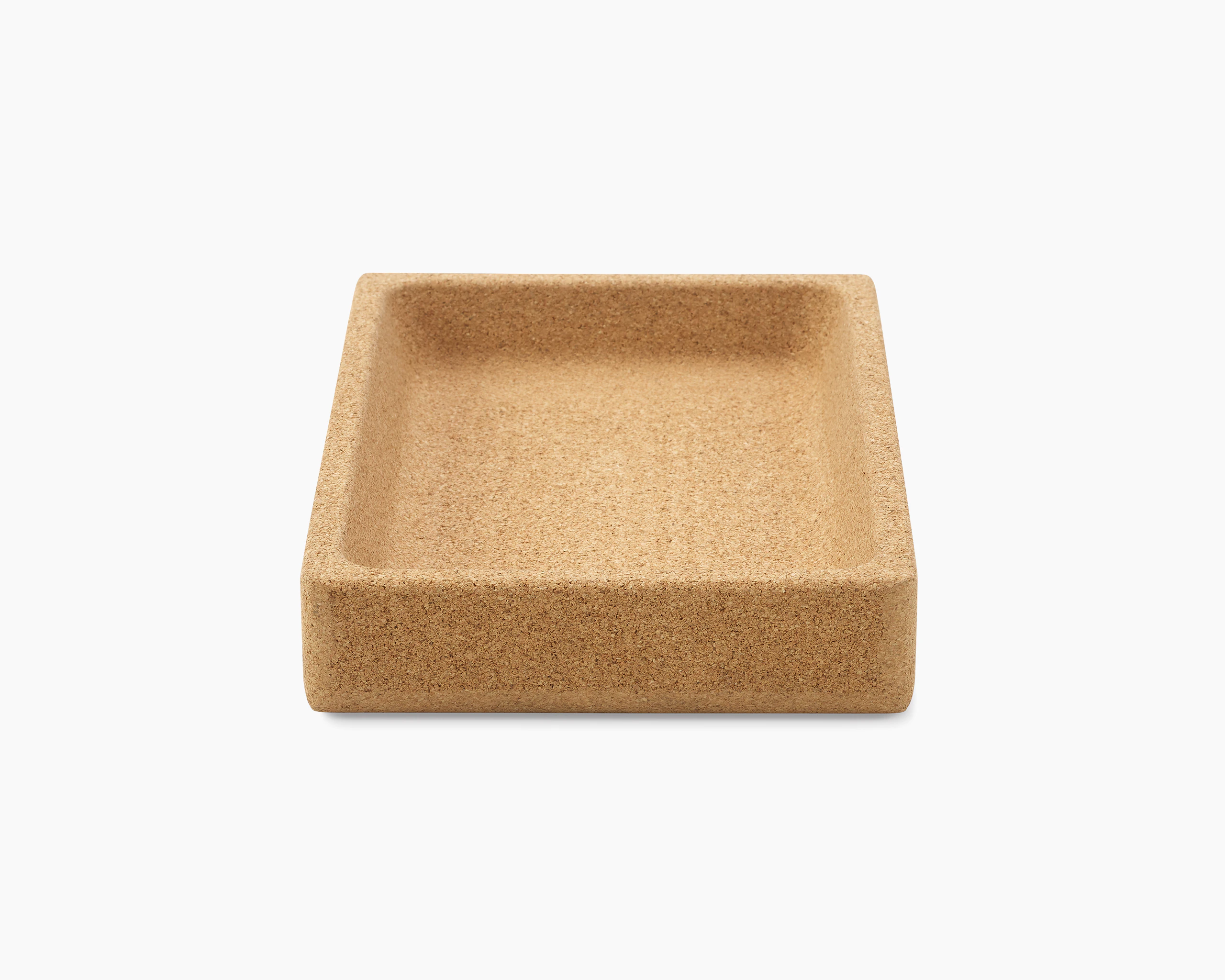 A small tray made of cork material.