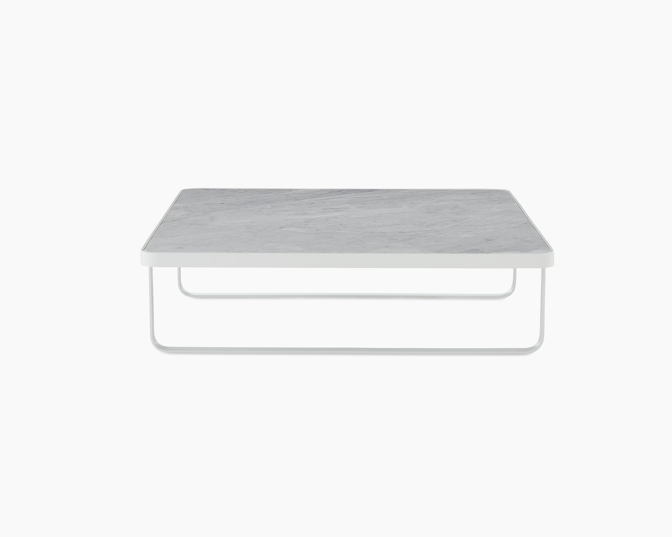 White sweep shot of white Trace Square Coffee Table with marble top.