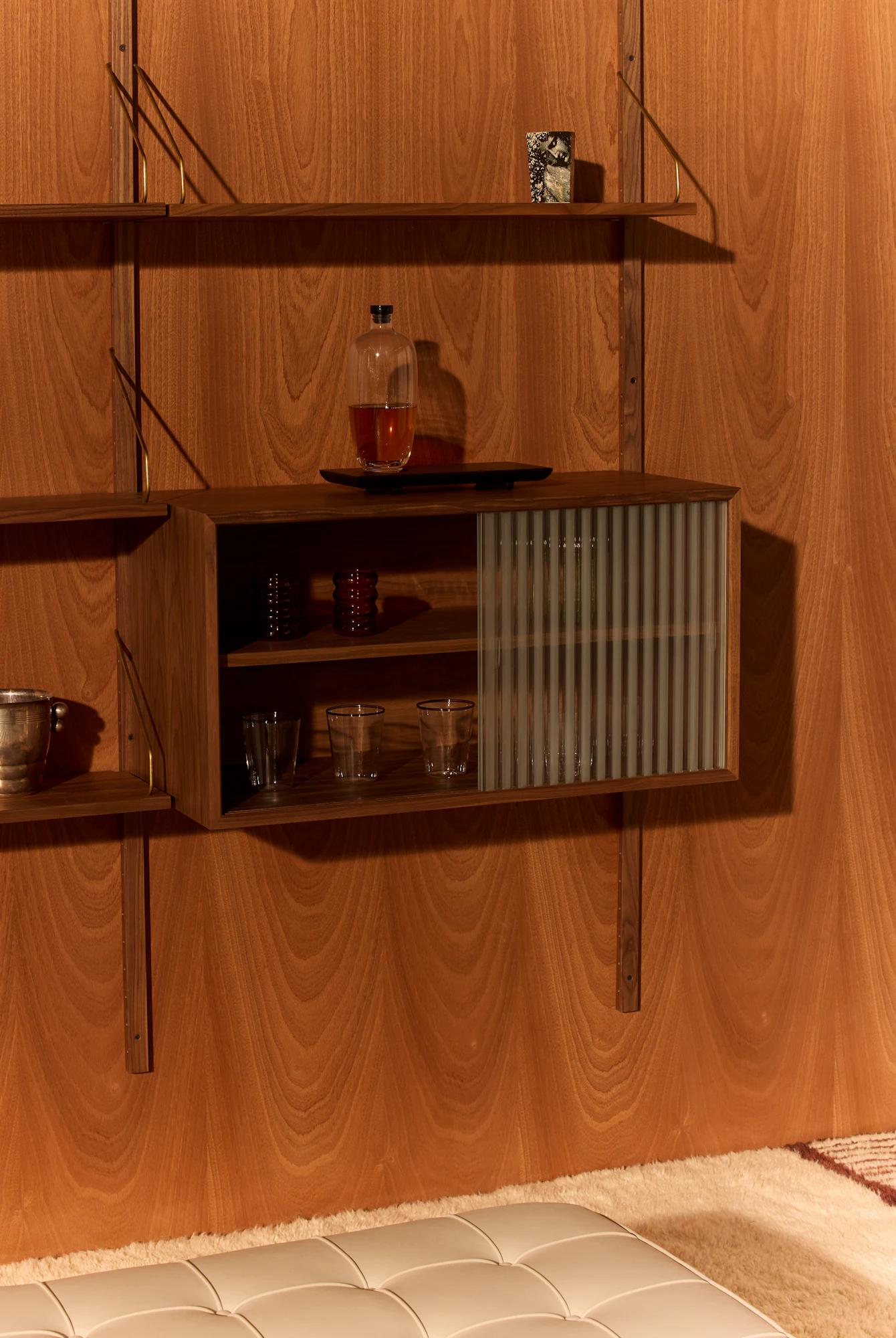 Royal System shelving cabinet with open interior and slatted door