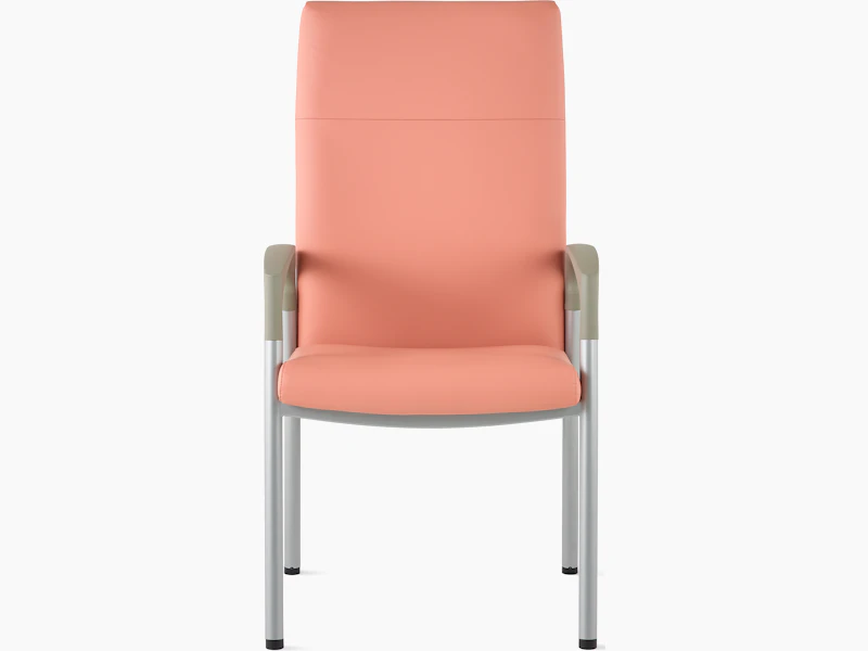 Front view of a high-back Valor patient chair in a salmon upholstery and silver frame with pewter armcaps.