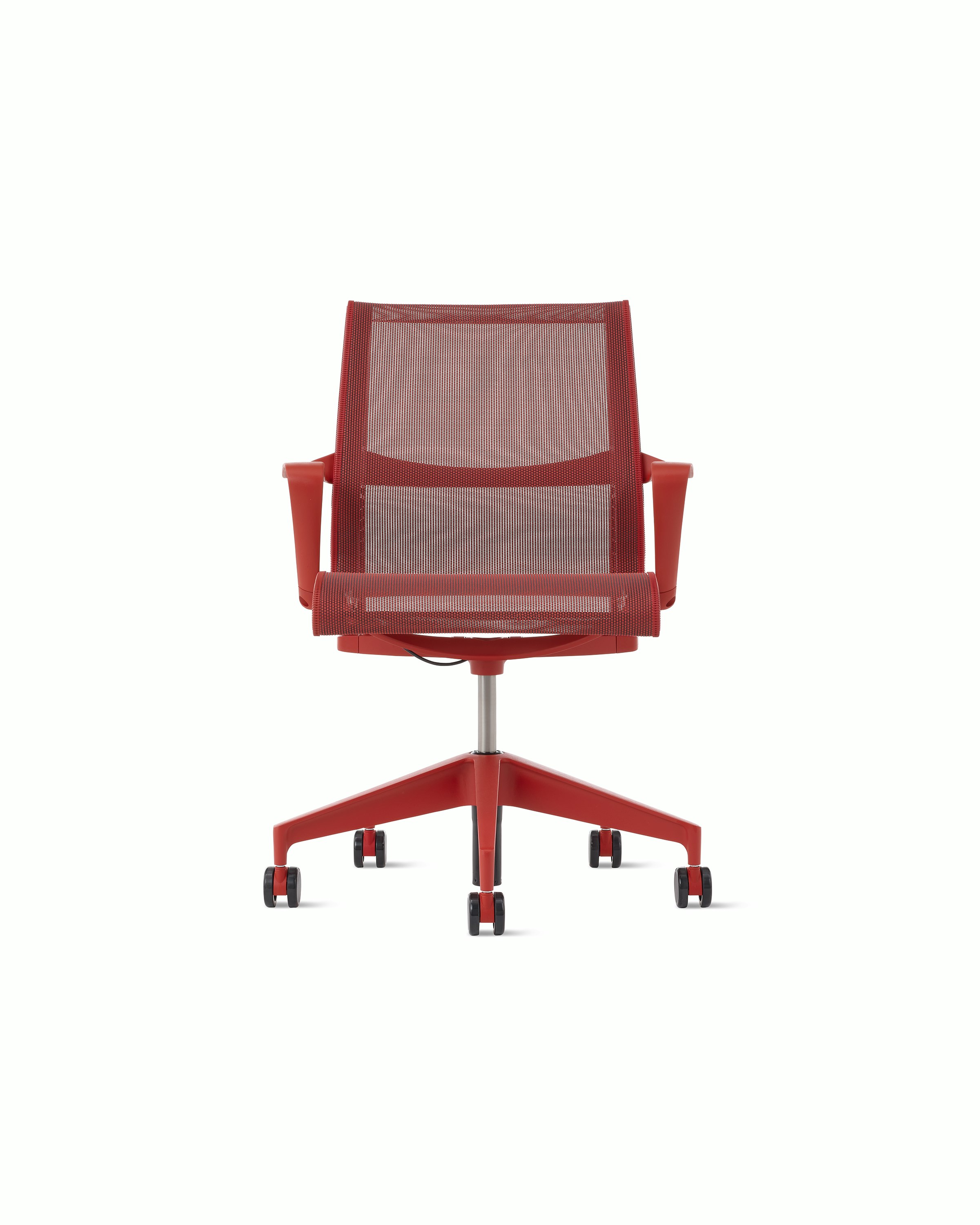 Front view of a Setu chair with fixed arms in red.