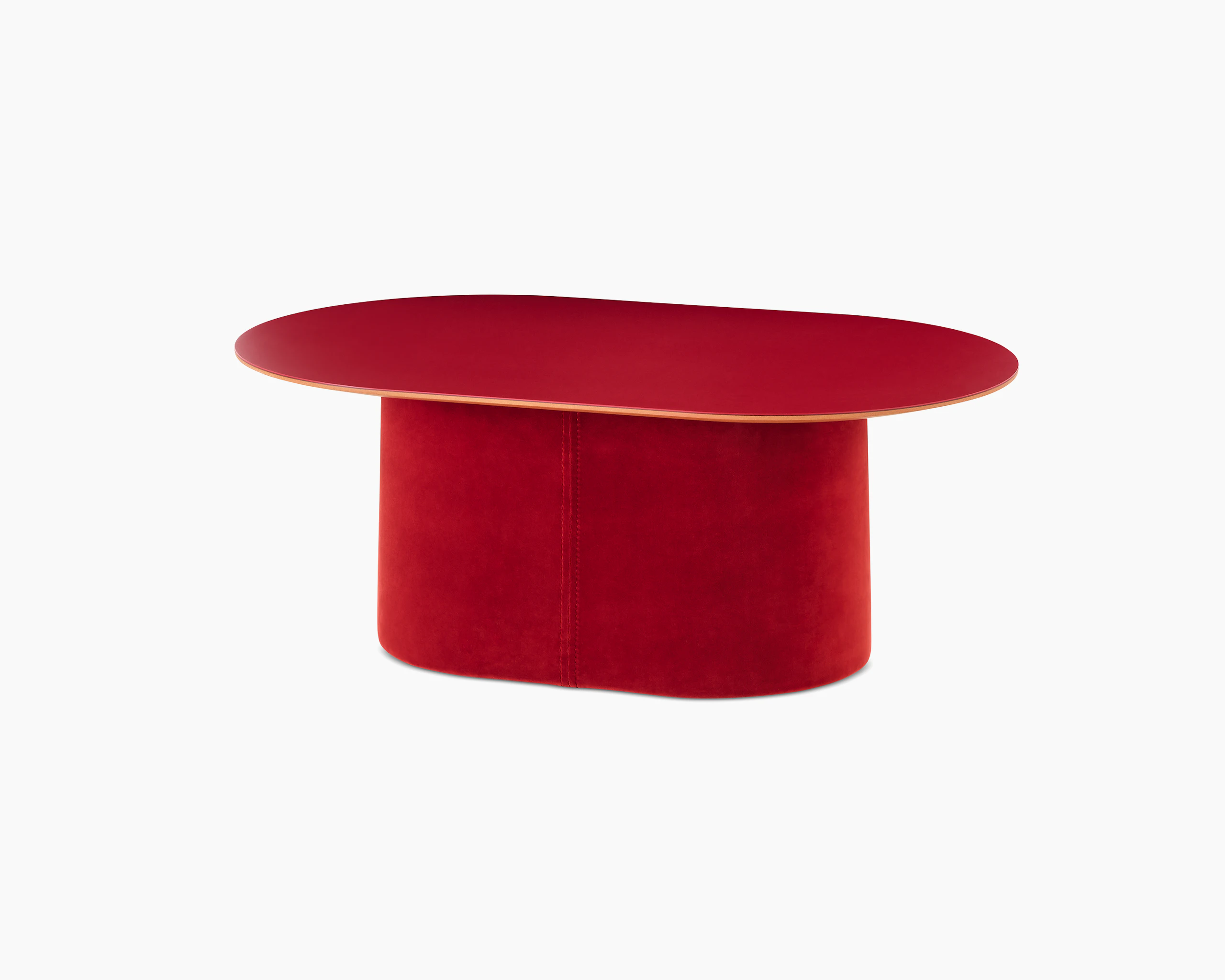 A front angled view of a Tun Coffee Table with deep-red upholstered base and red Forbo table top.