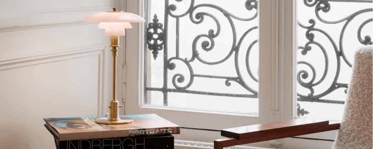 PH 2/1 Table Lamp on a living room side table