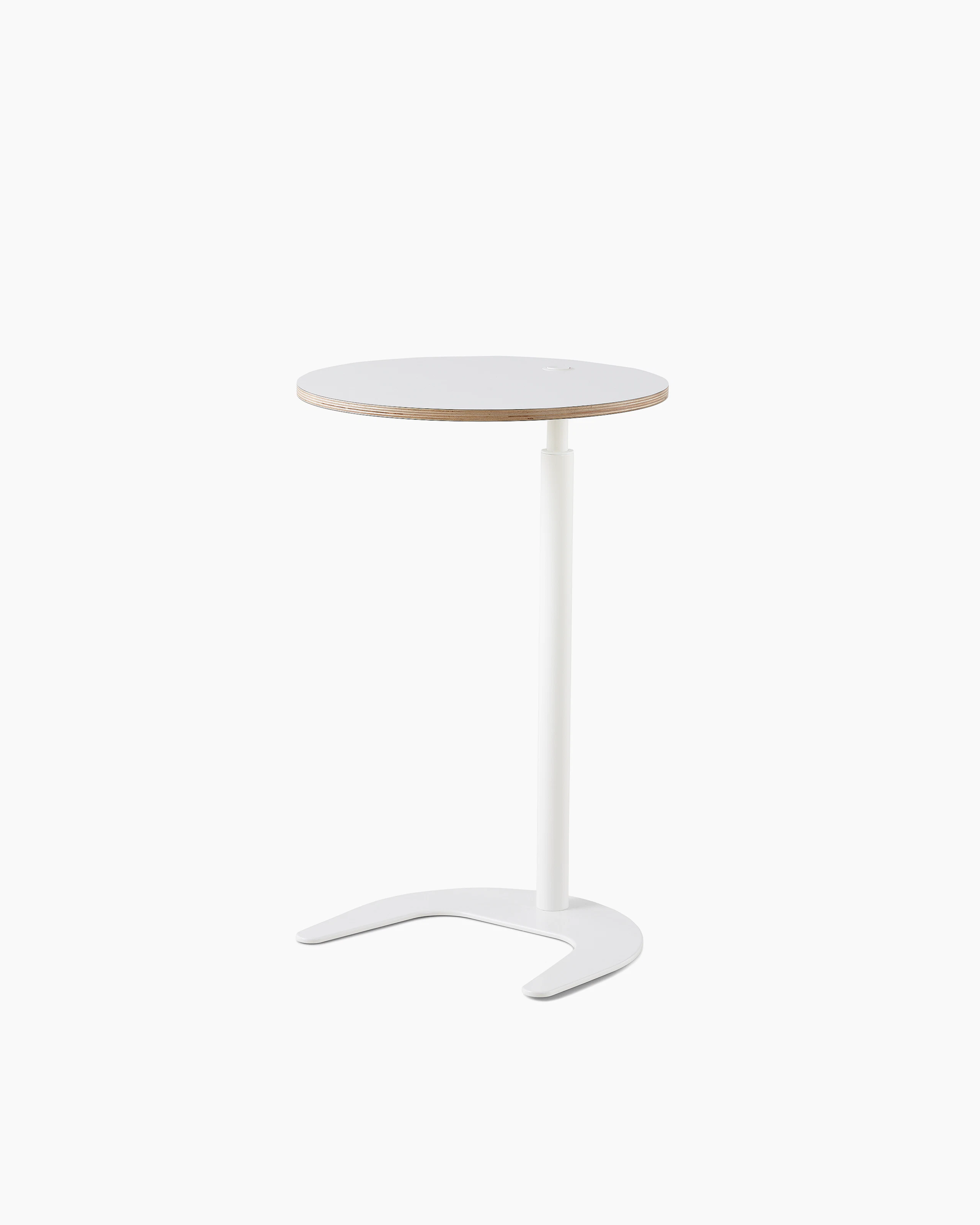A height adjustable Plex Work Table with a white top and white base, viewed at an angle.