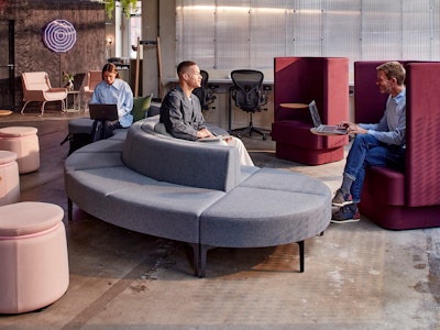 Reception area with Symbol Modular Seating, Lasso stools and Pullman Chairs, with Aeron chairs in the background.