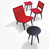 Risom side chair, stool, lounge chair and table in ebonized maple with red webbed seats
