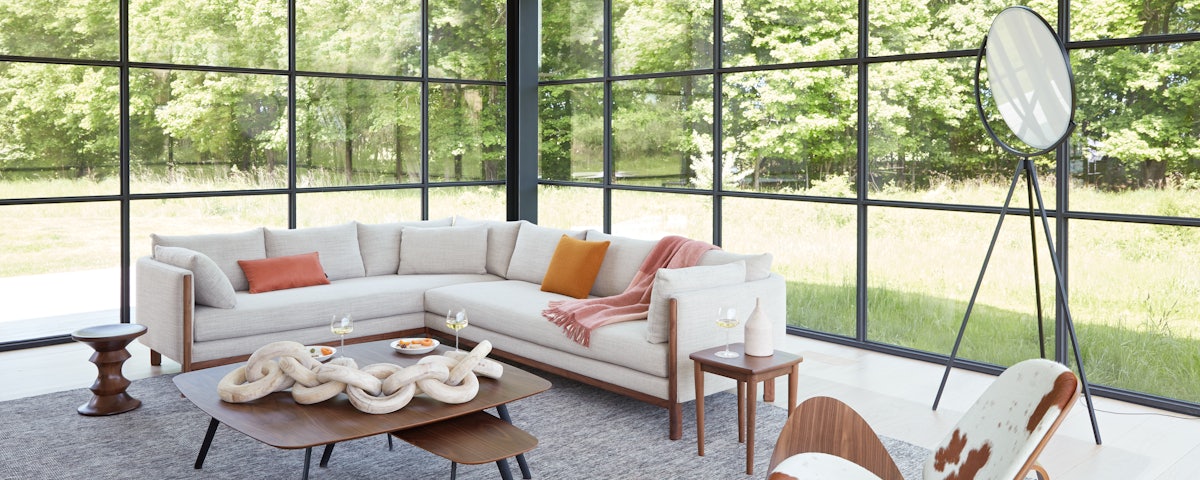 Superloon LED Floor Lamp and Emmy Corner Sectional in a living room setting
