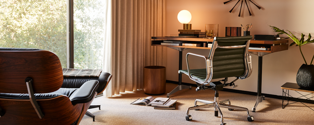 Eames Marigold Desk and Eames Aluminum Group Chair,  Tip of the Tongue Lamp,  Eames Lounge and Ottoman,  and Nelson Spindle Clock,  Risom Wastebasket,  and Eames Wire Base Low Table