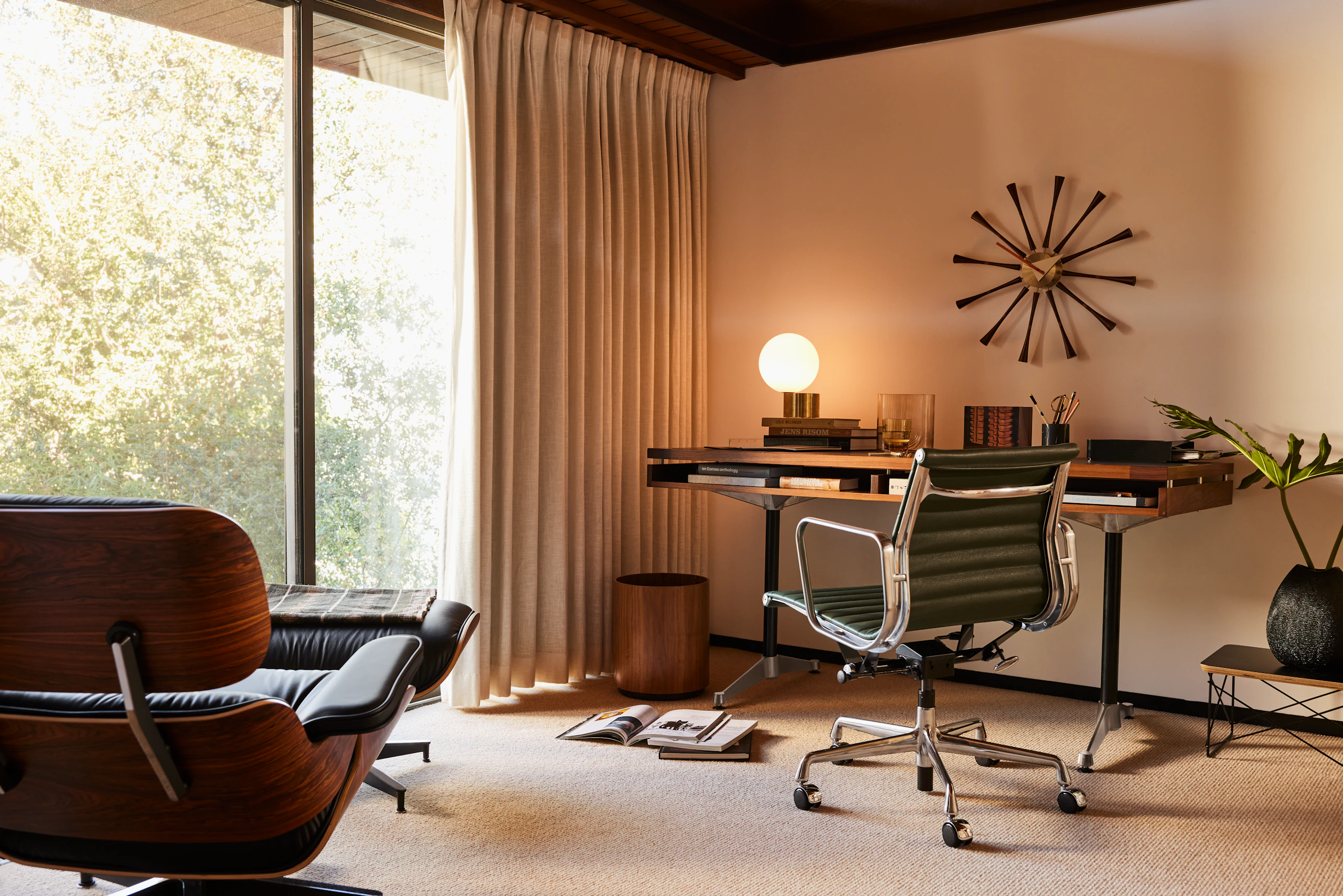Eames Marigold Desk and Eames Aluminum Group Chair, Tip of the Tongue Lamp, Eames Lounge and Ottoman, and Nelson Spindle Clock, Risom Wastebasket, and Eames Wire Base Low Table
