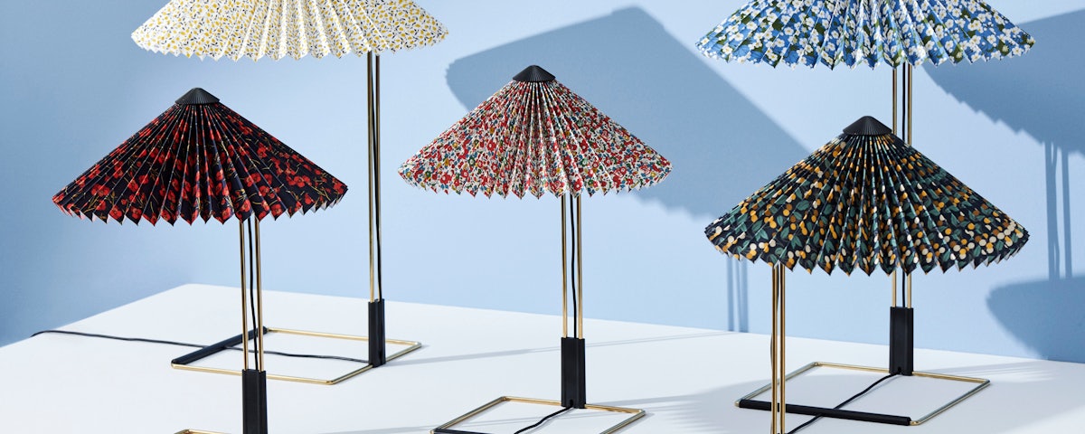 Five Matin Liberty Table Lamps on table