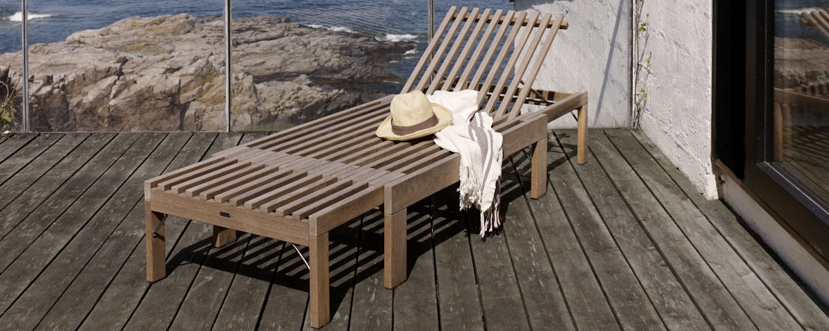 Riviera Sunbed in an oceanside deck setting