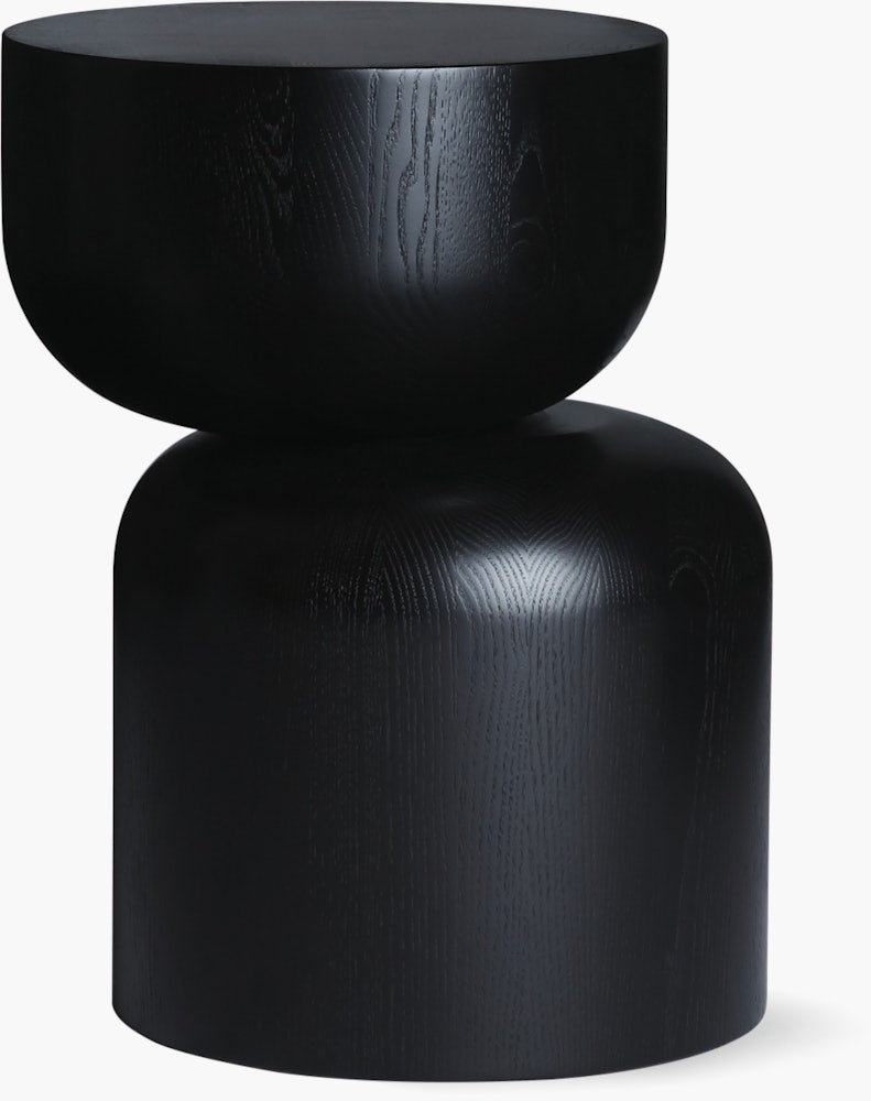 A Hew Side Table in a painted black finish.