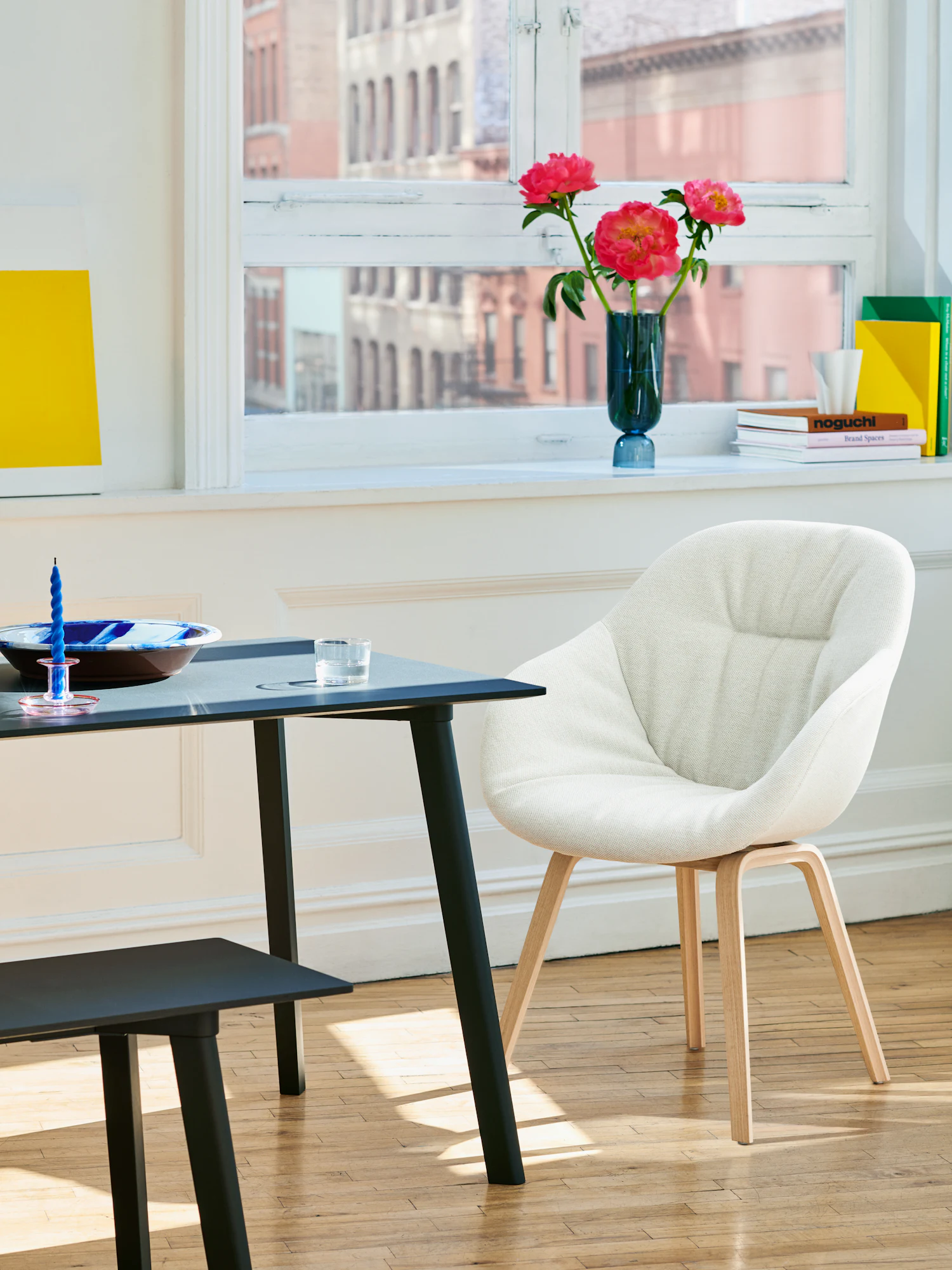About A Chair 123 armchair in light upholstery with light wood legs