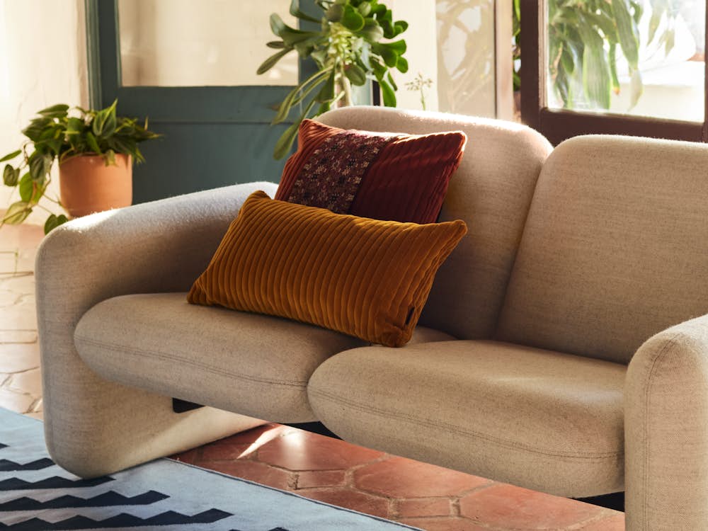 Wilkes Modular Sofa Group Sofa,  Girard Steps Rug,  and Wide Corduroy Pillows