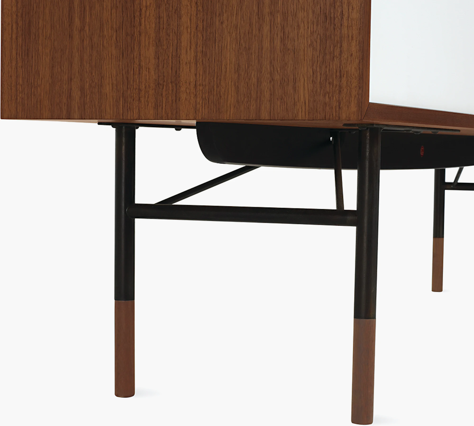 Credenza underside with dark metal crossbar legs