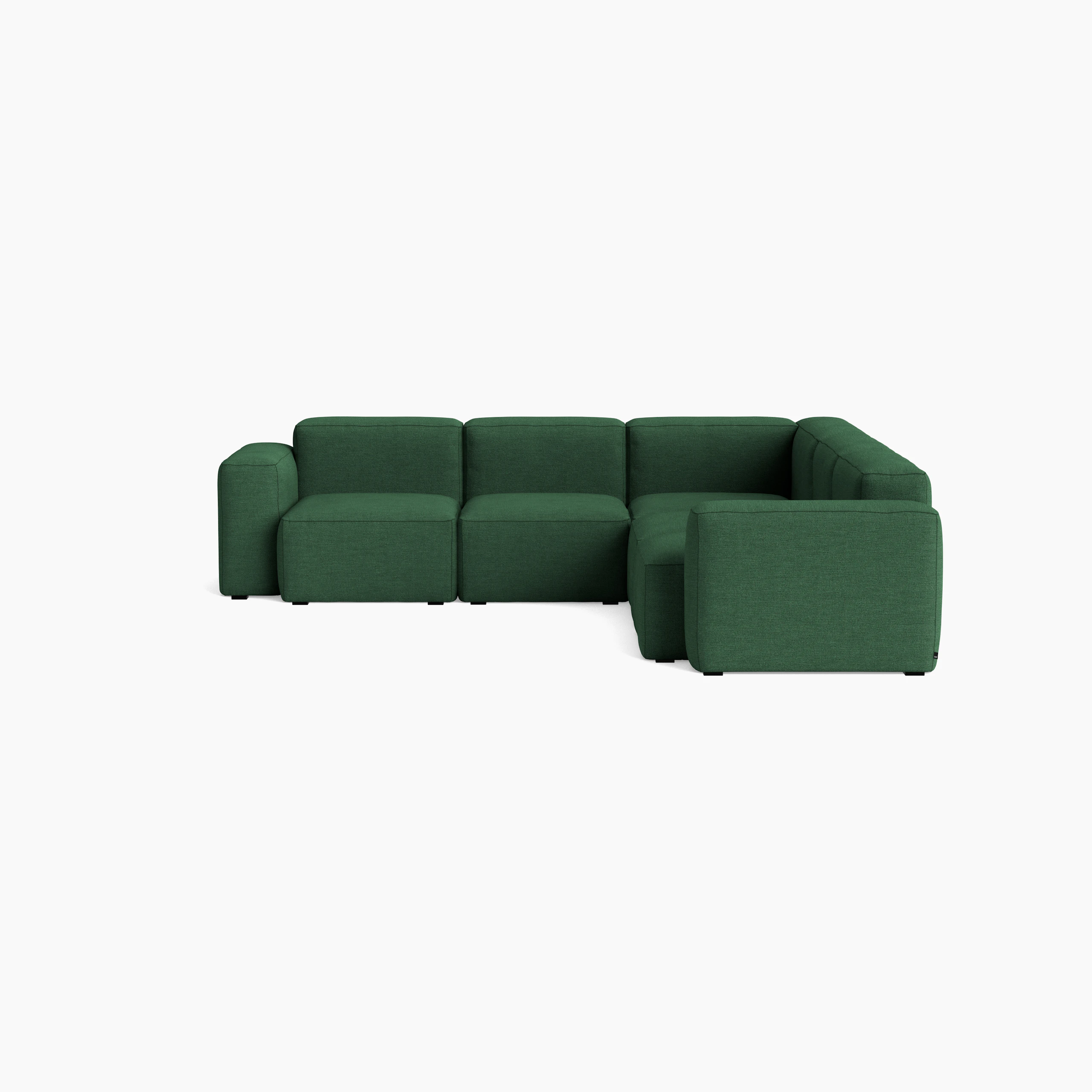 A front view of the Mags Soft Low Sectional in green.