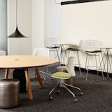 Rockwell Unscripted neocon showroom 2017 adaptive planning immersive planning rockwell unscripted sawhorse round table occasional table bertoia stool