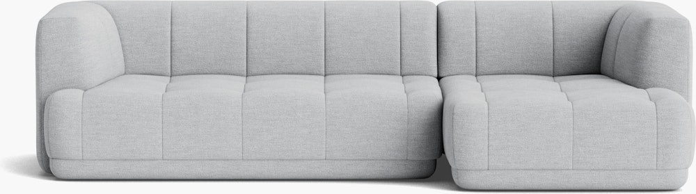 A front view of a gray Quilton Sectional - Right Chaise.