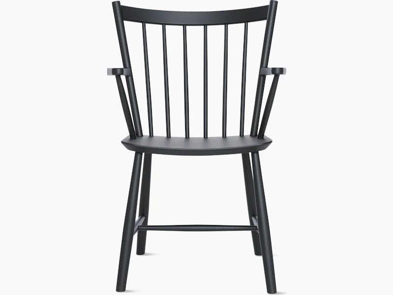 A black J 42 Armchair viewed from the front