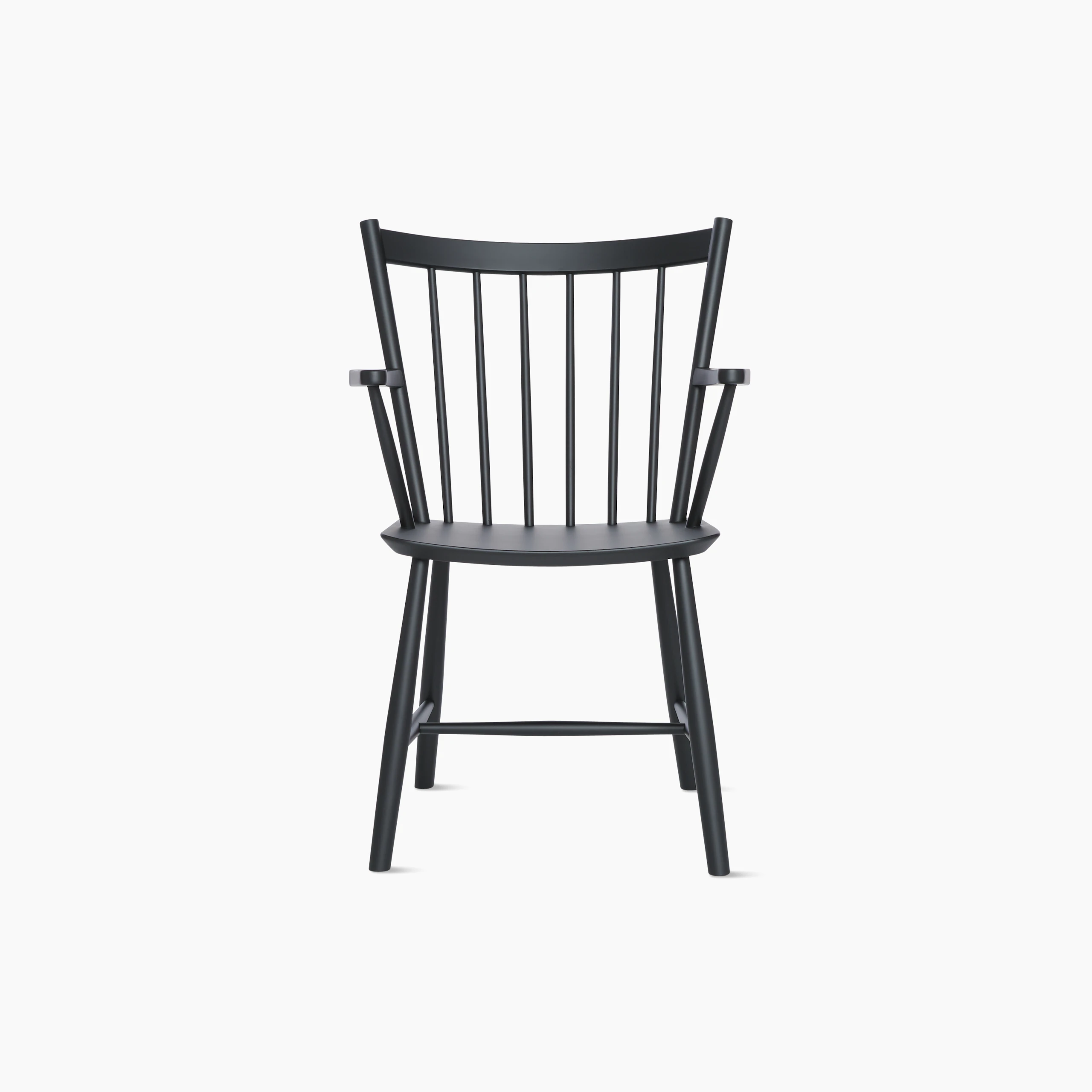 A black J 42 Armchair viewed from the front