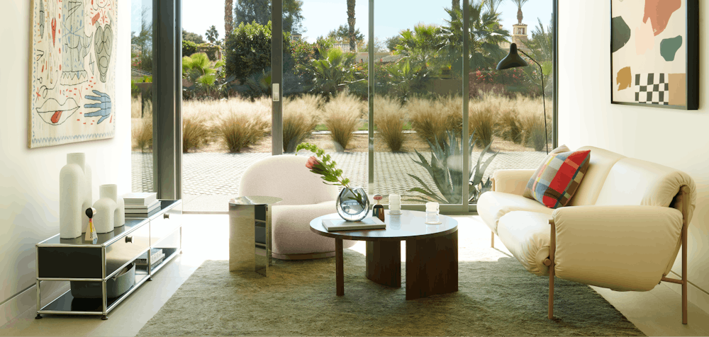 Ami Sofa, Symbol Coffee Table, USM Haller Open Media Console, Ruti Moroccan Wool Rug, Serge Mouille Floor Lamp, Slit Table, Riviera by Karina Bania, Pacha Chair, Hayon X Nani Tapestry, Cobra Vases