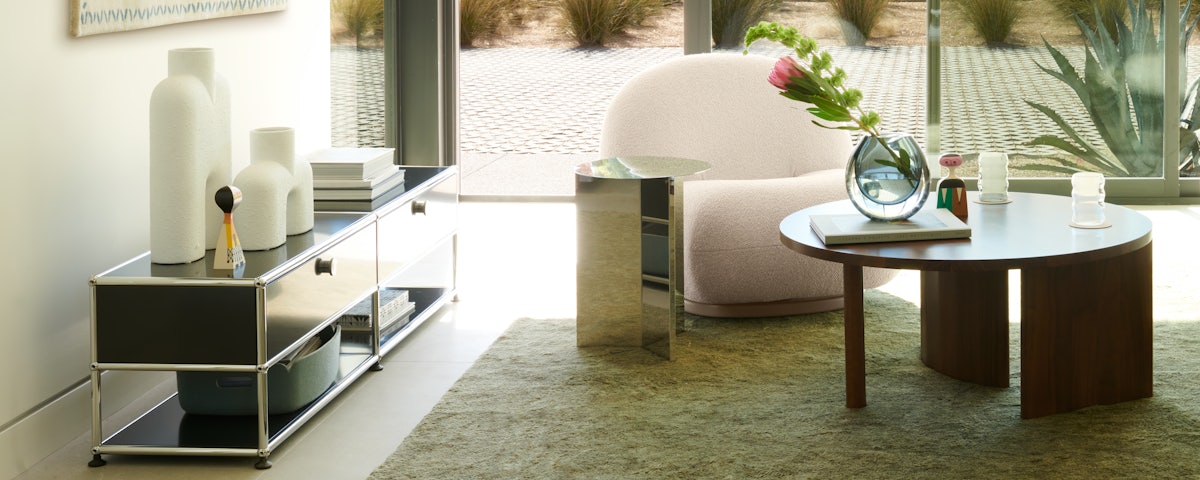 USM Open Media Console, Symbol Coffee Table, Ruti Moroccan Wool Rug and Pacha Chair in a living room setting