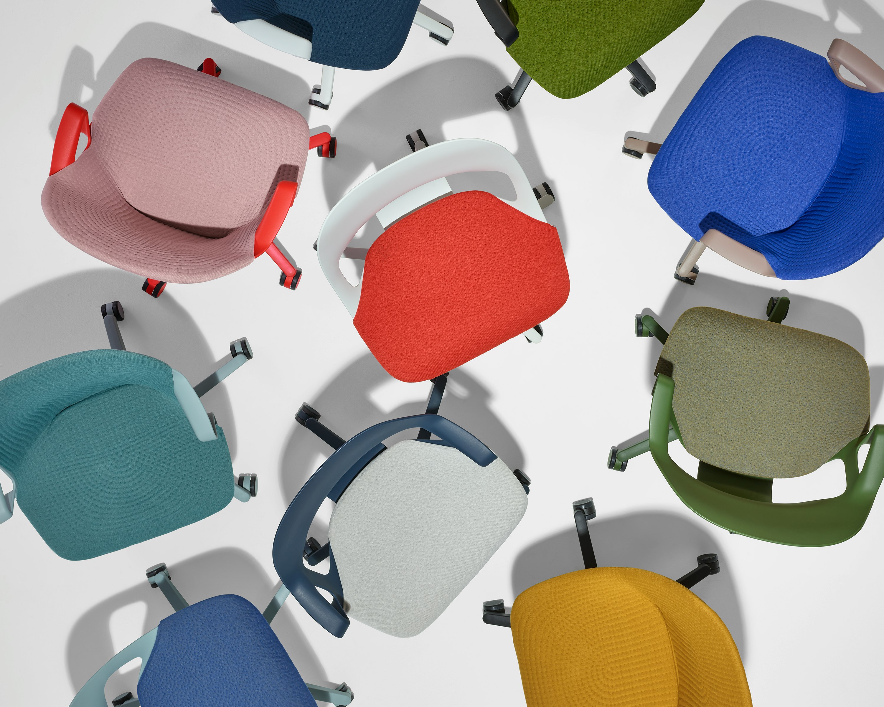 Overhead view of nine Zeph chairs in a multitude of colors.