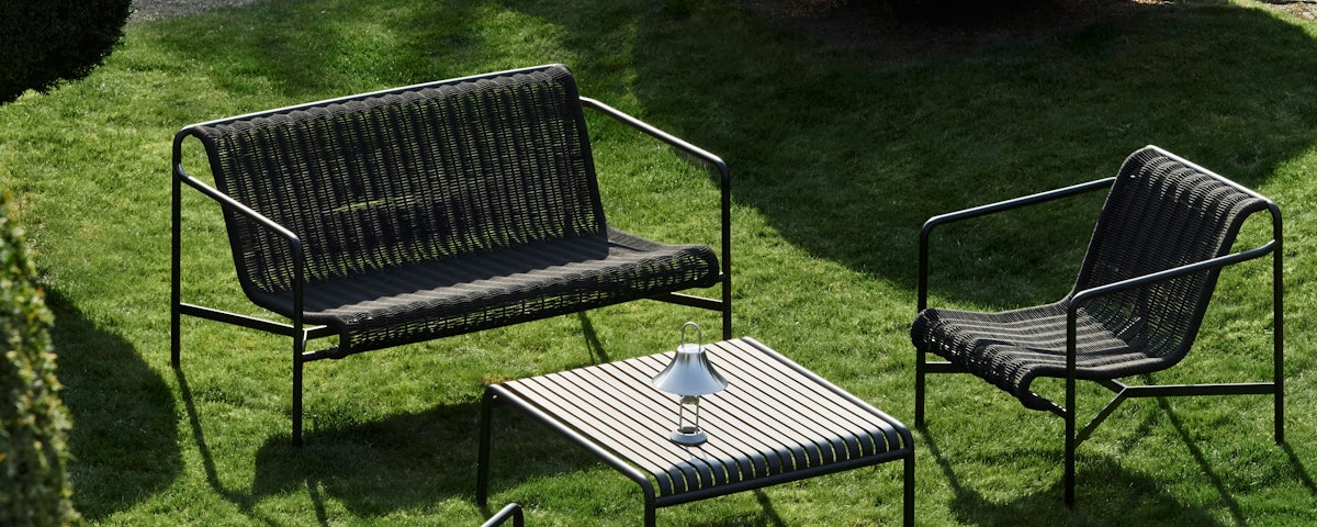 Palissade Cord Lounge Sofa and Palissade Cord Lounge Chair in a grass lawn setting