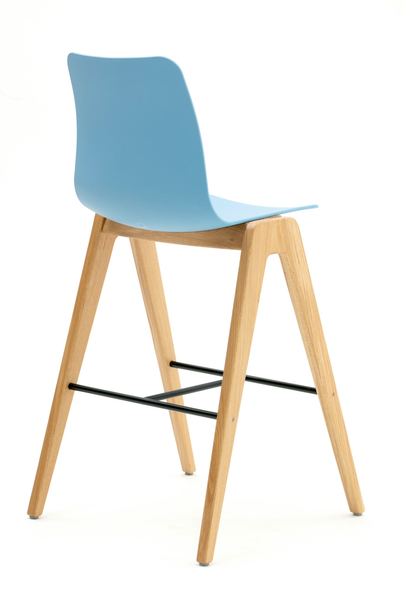 A light blue Polly Wood Stool, viewed from the back at an angle.