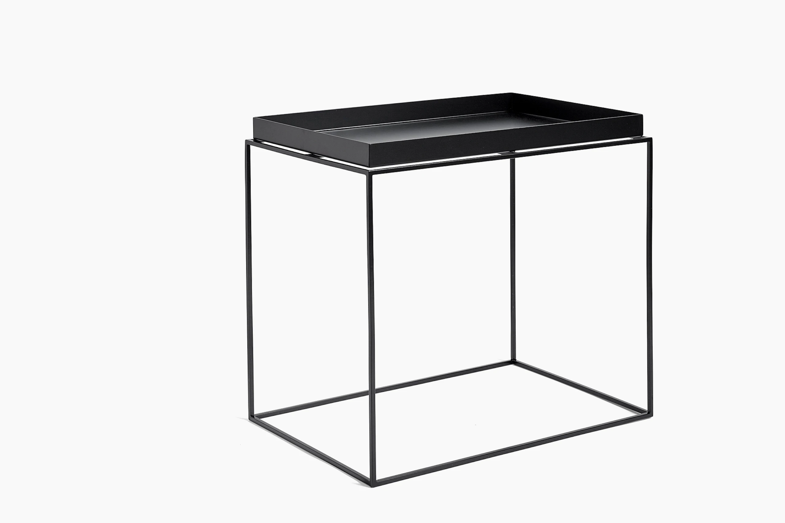 Black, rectangle Tray Side Table, viewed at an angle.