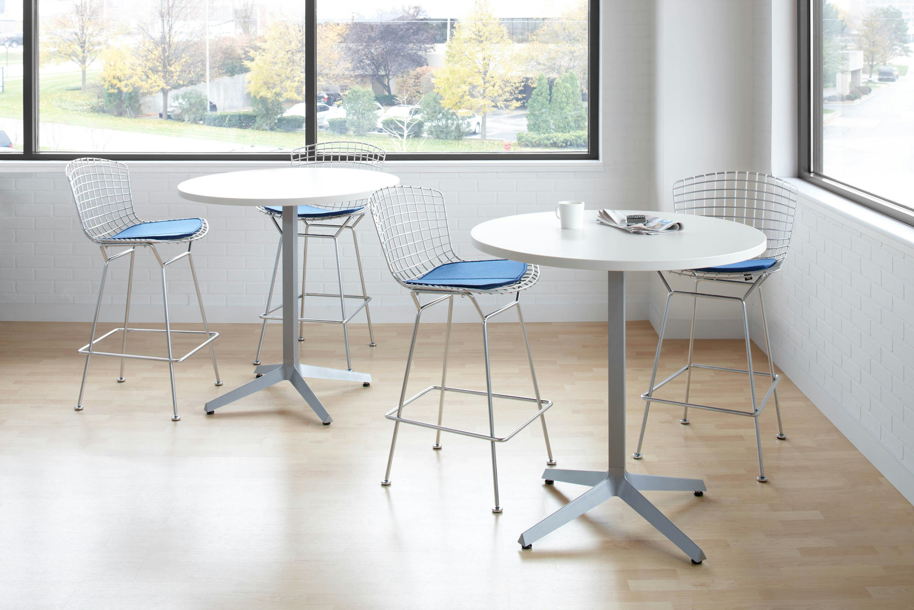 Dividends Skyline High Meeting Table with Bertoia bar stools.